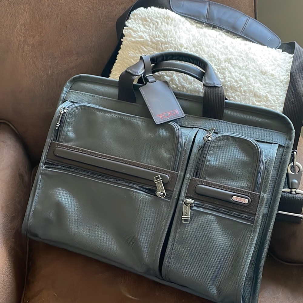 Tumi, Like new, never used. Bought before Covid then he retired.